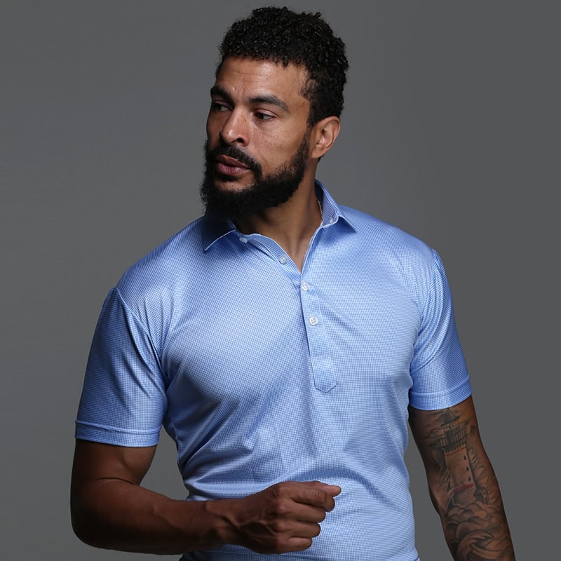 Male model wearing a blue Collars and Co shirt