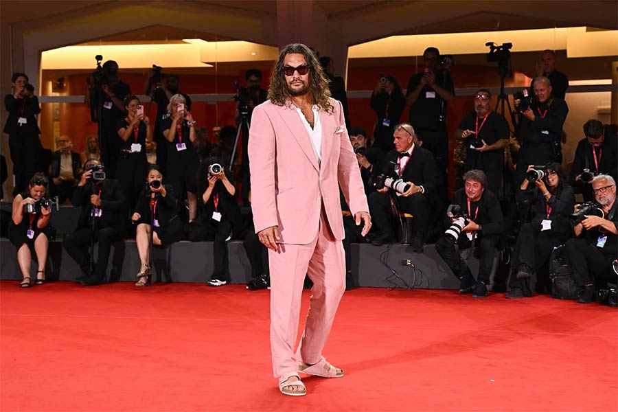 Jason Momoa Trends Pink on the Venice Red Carpet: From Suit to Birkenstocks to Nail Varnish