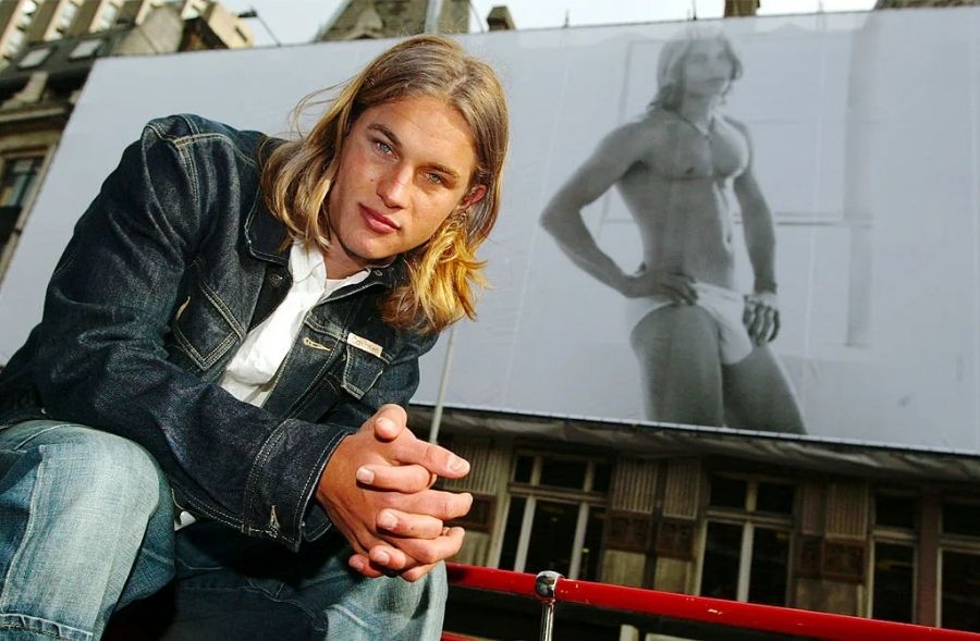 Travis Fimmel on the Times Square Calvin Klein underwear billboard in the early 2000s that was removed due to causing traffic disruptions